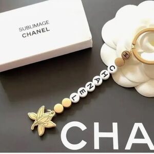 CHANEL Beaute Sublimage limited edition promotional Gold and White Keychain
